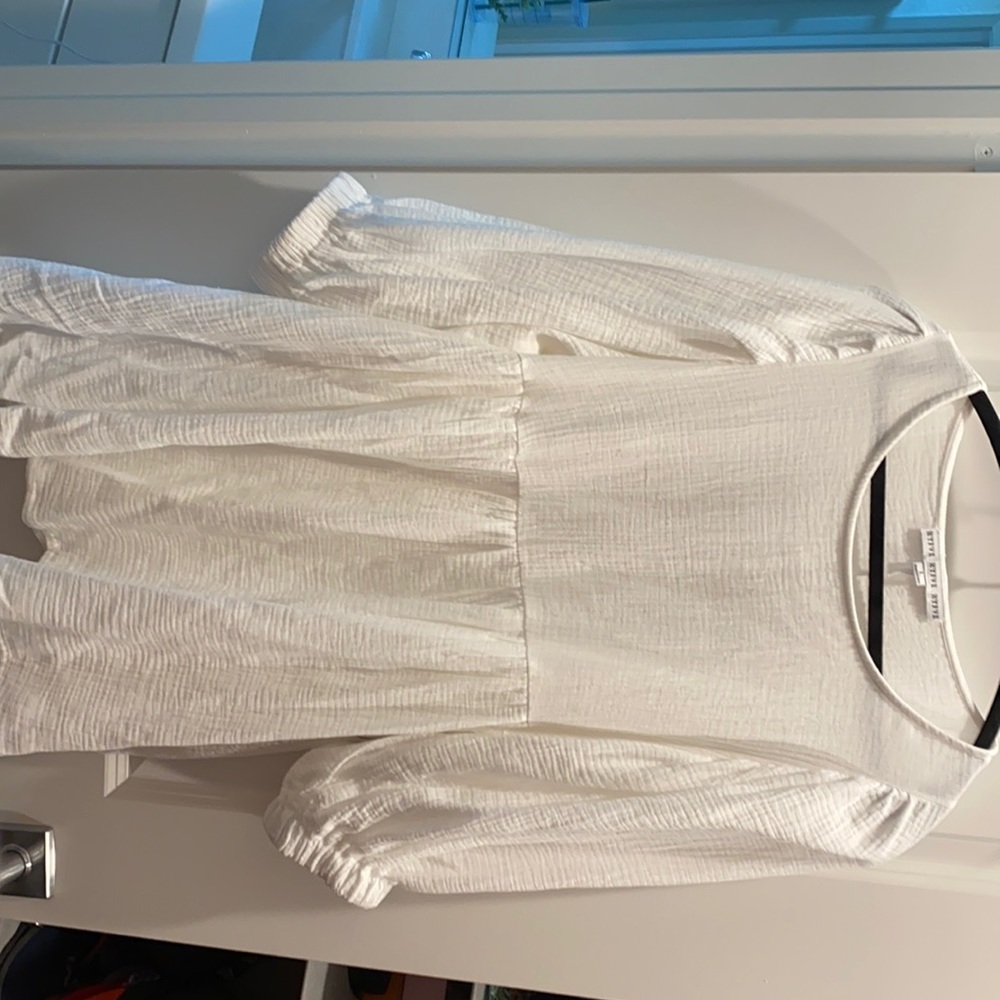 Brand new White long sleeved baby doll dress